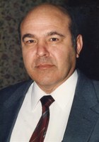 Charles E Scandalito